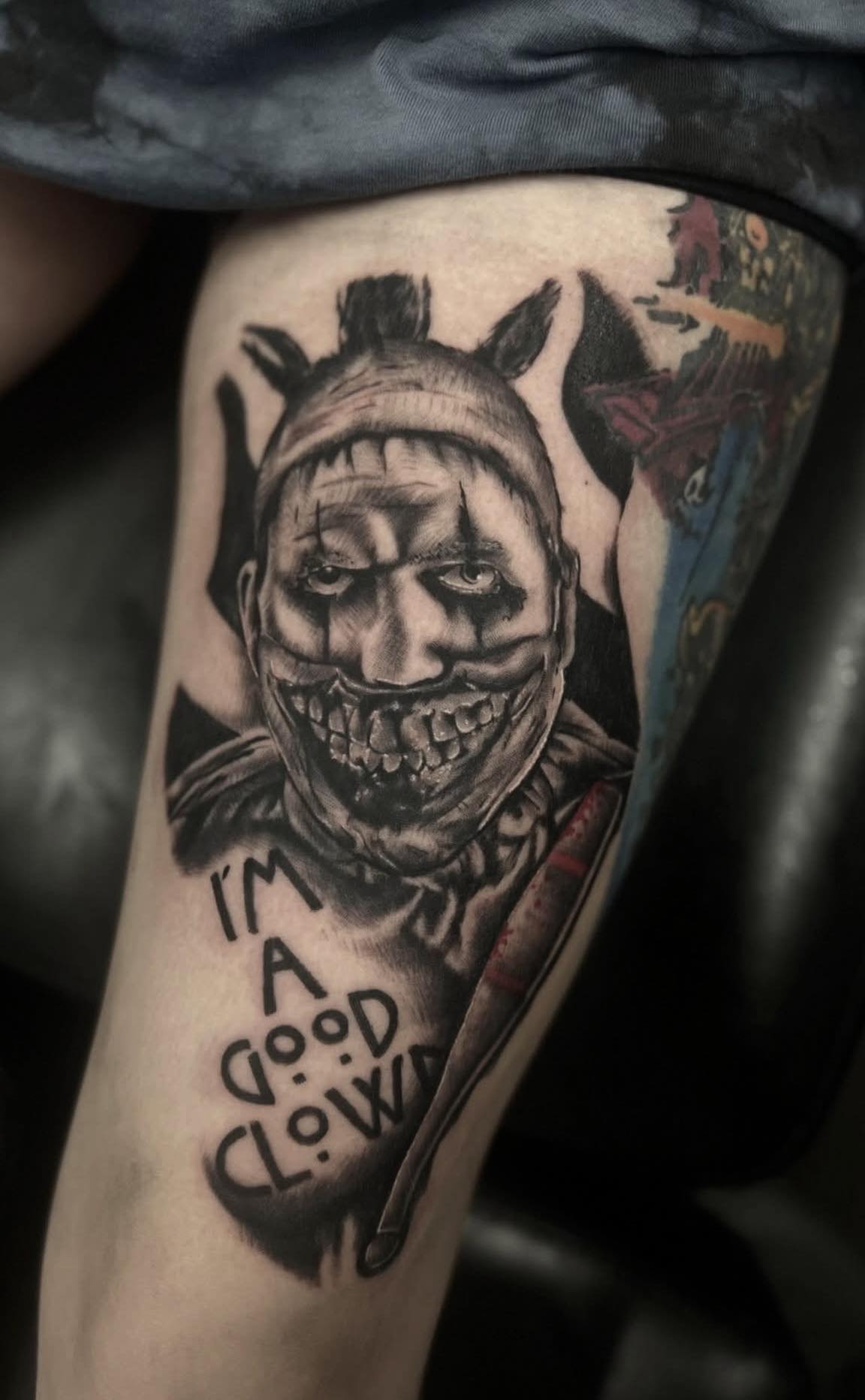 Horror clown tattoo on leg
